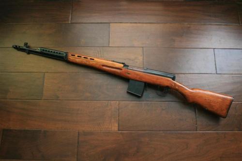 gunrunnerhell:  SVT-40 The failed attempt to replace the Mosin Nagant 91/30, the SVT-40 is chambered in the same 7.62x54R cartridge. You’ll note that both the left and right side of the stock have cutouts near the trigger area. This is an immediate