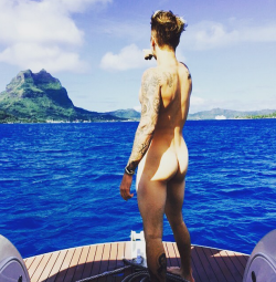 glad2bhere:  glad2Bhere.tumblr.com/archiveJustin Bieber Strips Naked to Bare His Butt on a Boat!i heard a lot of talk about this photo today on the radio ………..  the talkers made it sound like it was not flattering  ……….  I LIKE your butt,