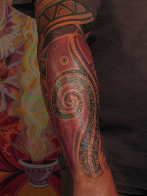 Tattoo process from a renovation of an old tattoo along to a full sleeve.Tattoo by Daemon Rowanchild