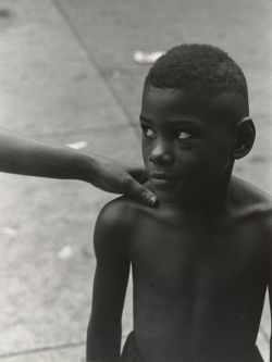 Boy, Woman’s hand on shoulder, 1952Roy