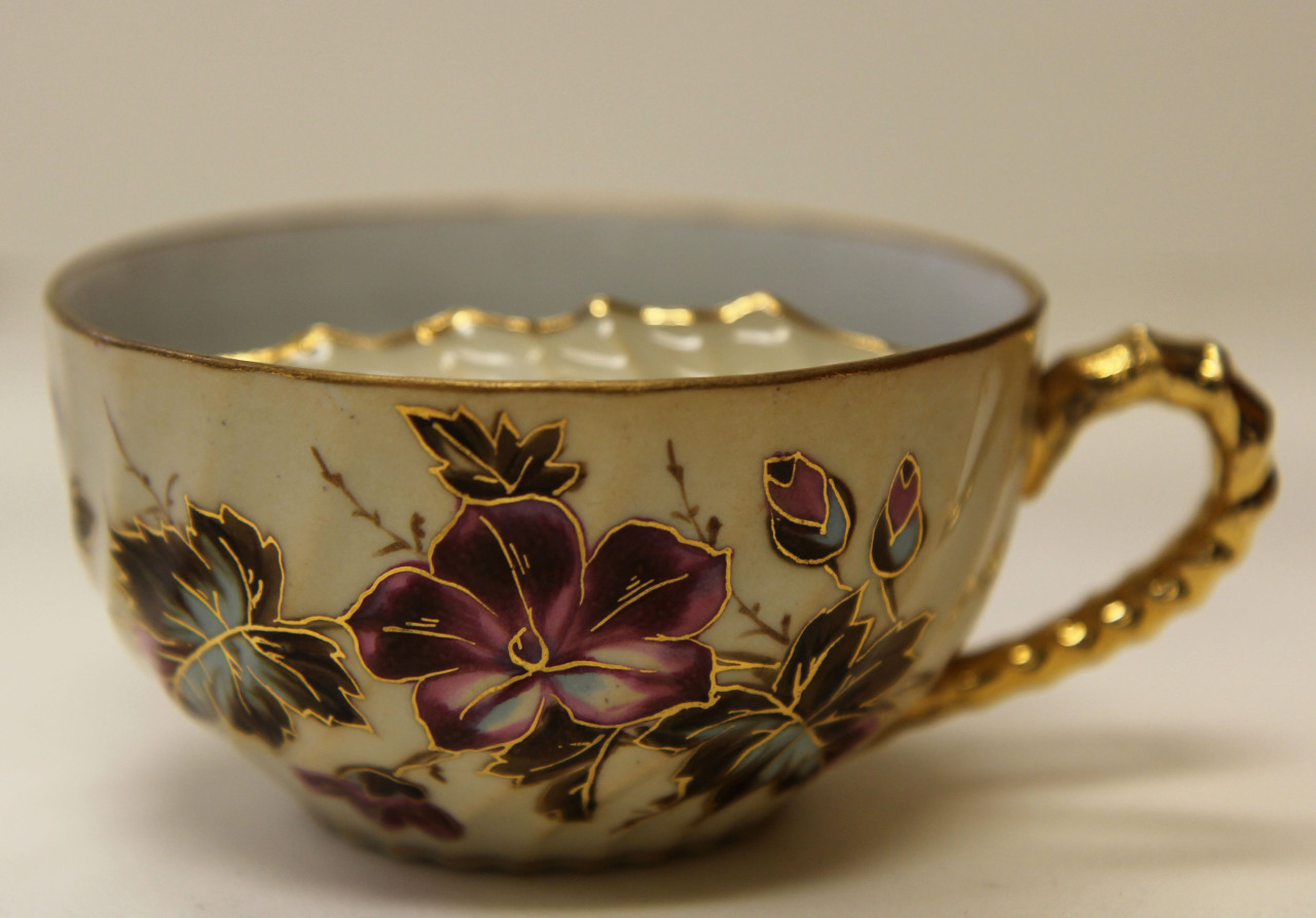 flemingmuseumofart:  Teacup with mustache guard. Glazed porcelain, gold. c. 1885.