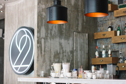 Hatch 22: Cafe &amp; Bakery Besides the wooden table tops, cemented walls and high ceiling, what
