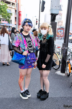 tokyo-fashion:  Bunka students with colorful hairstyles &amp; gun/flame tights on the street in Harajuku. 