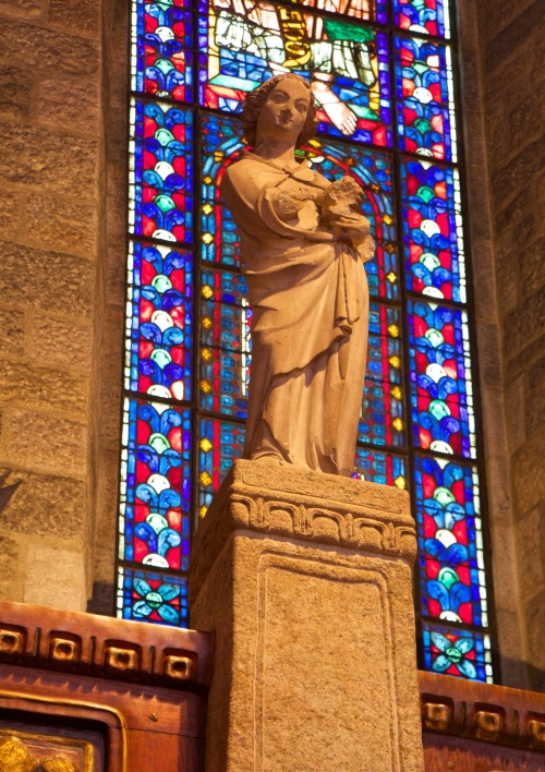 This statue of a standing male figure on the second-floor balcony of the Great Hall, and also the st