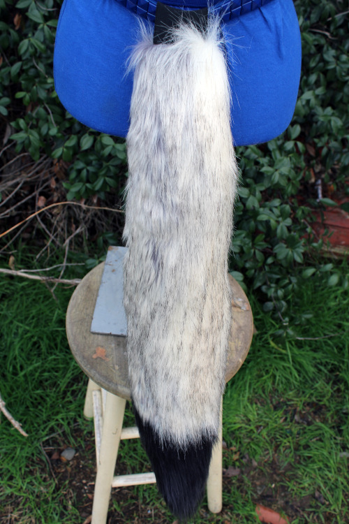 Long Fox Tails Silver fox with a black tip. This is the silver version of honey fox. :3See something