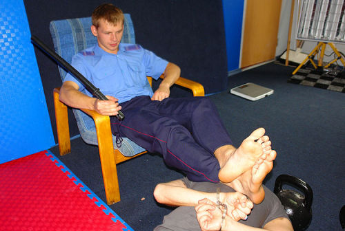 humiliationverbale:  sub knows ts place and duties on the feet of this young Superior with amazing hot soles 