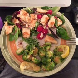 mehiradeoro:  Healthy dinner!Salad: Almond slices, raspberries, chicken, Parmesan, pomegranate vinaigrette, and spring mix salad Lemon-garlic Brussel sprouts, recipe here (Gruyere cheese optional) 