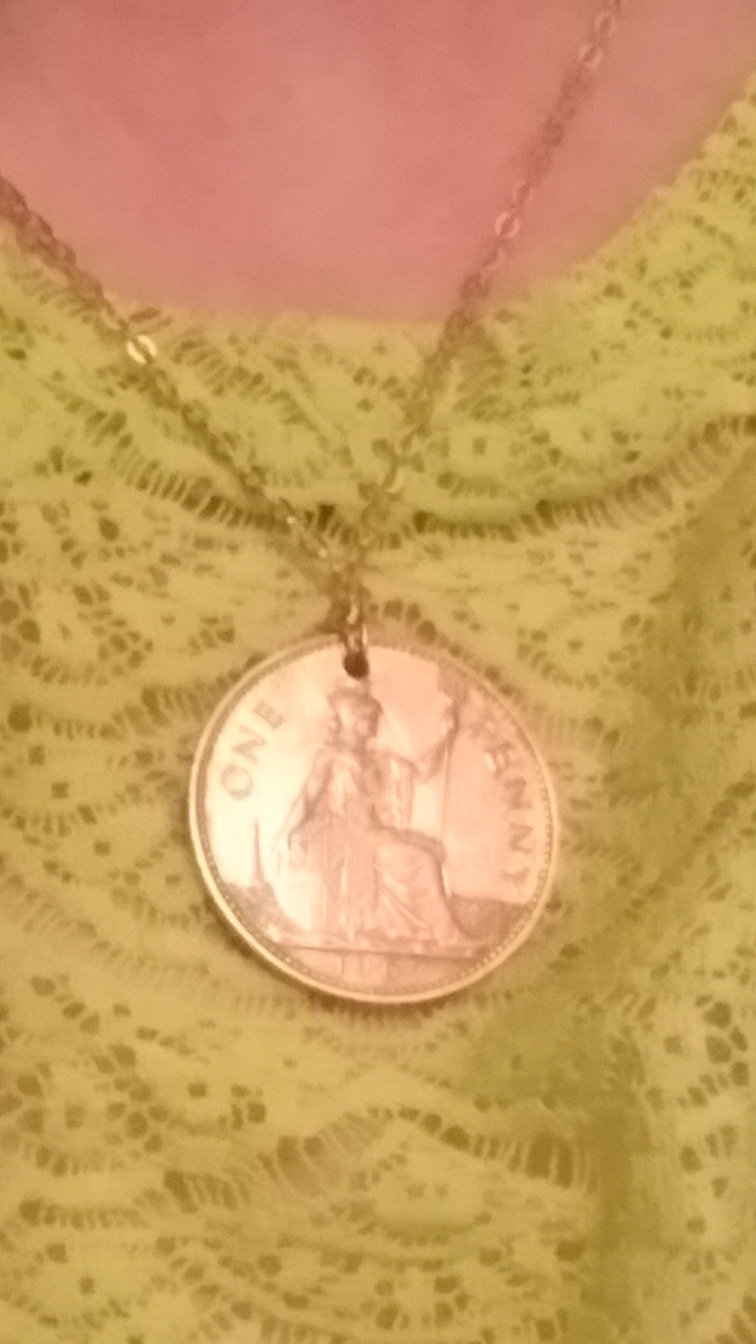 I made a penny shine, and hung it by gold across my breath.In other words, I made