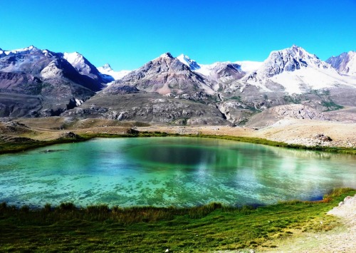 theencompassingworld:    A Colorful Lake In Lashkargaz, Brogil Valley, Pakistan | By Noman Subhani  More of our amazing world