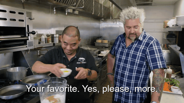 90% sure it's Guy Fieri cooking in a kitchen preparing food. Caption: Your favorite. Yes, please, more.