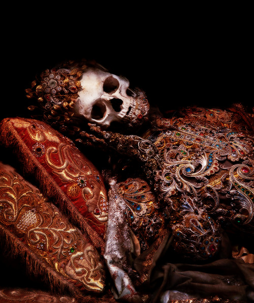 unhistorical:   …the Saints are displayed in a cathedral in Eastern Germany close