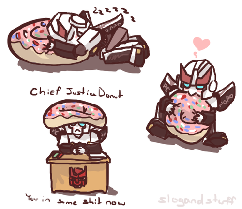 slogandstuff:  officialprowl:  baby prowl with a mini donut pillow  sometimes he wears it as a hat   He keeps a smaller version in his desk now. He doesn’t chew on it to let it know it’s loved anymore though. 