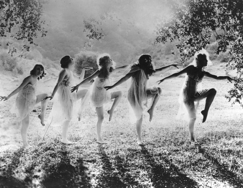 hauntedbystorytelling:Open air dance, 1924A group of women dancing in the open air, 1924. | src Cent