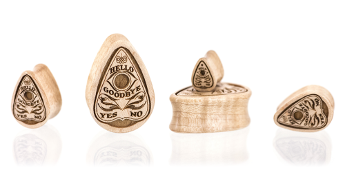 Planchette Teardrop plugs Those who accept the paranormal believe that the planchette is moved by sp