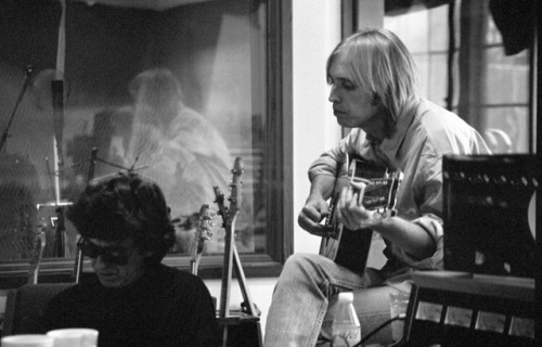 thateventuality:  George Harrison and Tom Petty during the Traveling Wilburys Volume 1 recording sessions, 1988. Photo by Don Smith, 1988, © T. Wilbury Ltd., and courtesy of the book Living In The Material World.“More than anything else Petty has ever