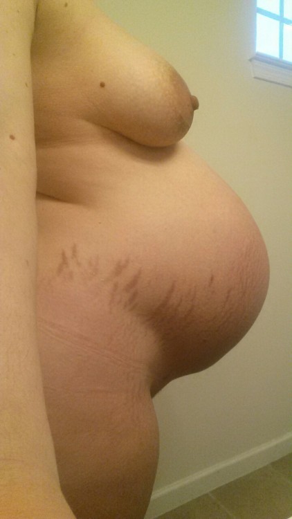 pregnantcuntfuckers: My pregnancy makes me horny! Somebody please fuck my wet pussy! Click here!