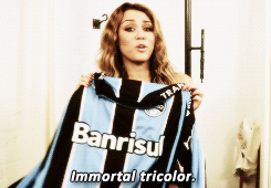 fullscircle:  Miley with uniforms of some brazilian soccer clubs. 
