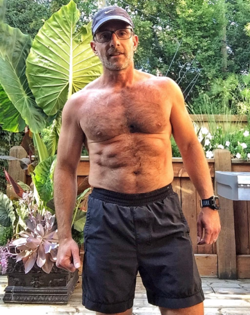 justjimbo: Summer’s here which means watching my hunky neighbor relaxing on his deck, shirtles