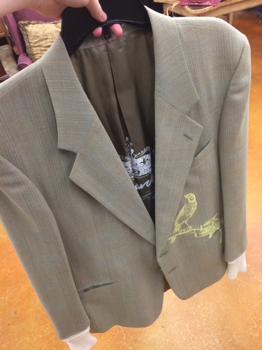 arodudejude:  arodudejude:  arodudejude:  looK AT THIS AWFUL JACKET I FOUND IT AT GOODWILL AND IT’S THE MOST GOD-AWFUL GARMENT I HAVE EVER LAID EYES ON LOOK AT THIS IT’S GOT A BIRD WITH A GUN PRINTED ON THE SIDE THERE ARE SWEATER SLEEVES ON THE ENDS