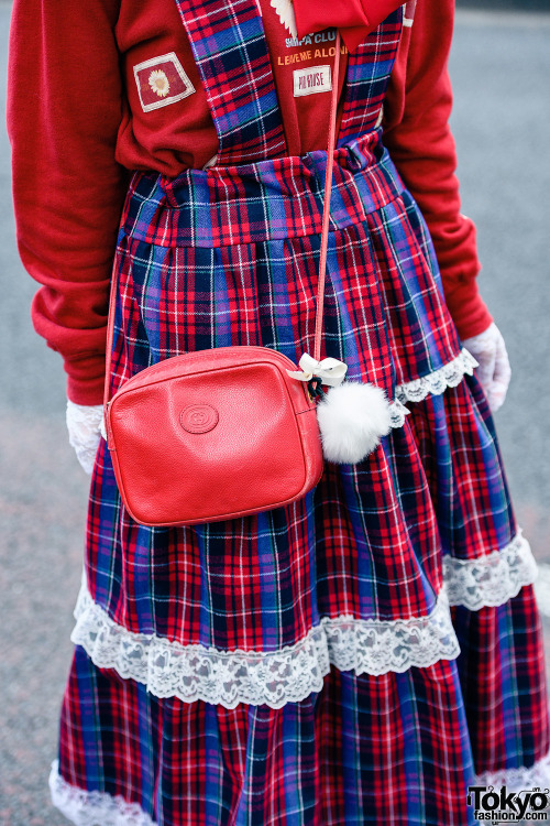 Japanese designer Rio on the street in Harajuku wearing a sweatshirt by Pink House with a handmade p