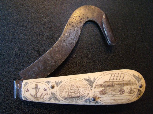 Sailor’s folding tool with a beautiful scrimshaw on the handle, 19th century The shown side features