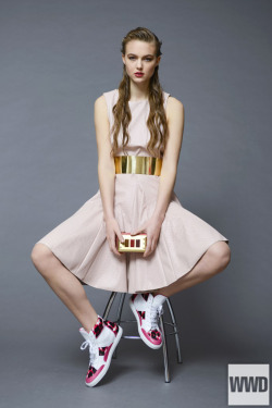 womensweardaily:  Spring 2014 Trend: Pink Outside the Box Photo by Giovanna Pavesi Gianluca Capannolo’s leather dress and metallic belt. Carmina Campus bag; Alberto Moretti sneakers. 