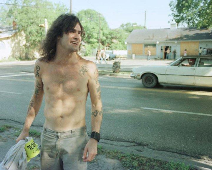 poison303:  Henry Rollins, 1985, Houston. Note Black Flag Koozie in hand and man