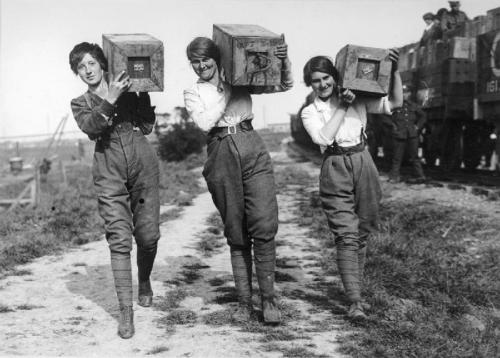 historynet:  Photo | Women carrying salvaged shell-boxes