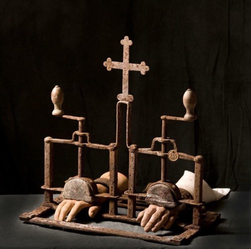 ancientorigins: Hand crushing machine used by the Catholic Church in the 15th century to punish thos