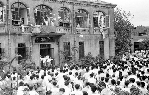 An embassy building is overrun during anti-American riots in Taipei, Taiwan. 1957.