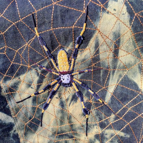 bananapeppers:“Golden Silk Orb Weaver” denim jacket and hand-embroidered appliqué patch by Glenn Dav