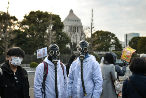 Anti-nuclear protesters gather at a rally in front of the parliament building in Tokyo, Japan March 