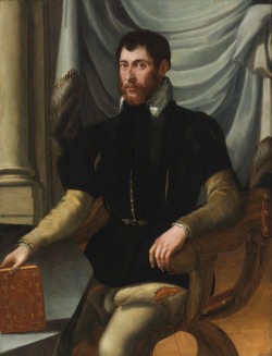  (Italian, 1535-1572), Portrait of a Seated Man Holding a Book. Oil on panelMirabello Cavalori