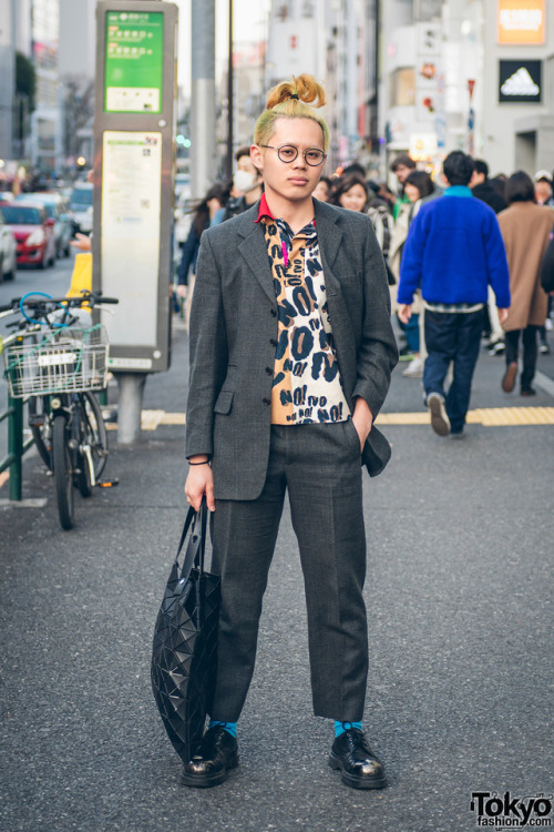 20-year-old Sano on the street in Harajuku wearing a Paul Smith suit with a Tigran Avetisyan shirt, 
