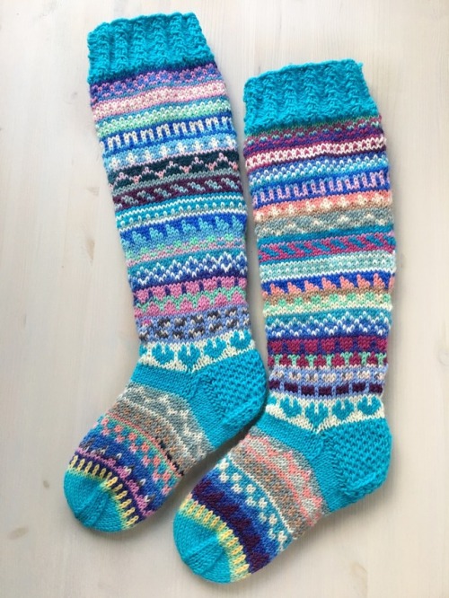 These socks were such a fun knit, used about nine different yarn found from my stash. Lots of self s