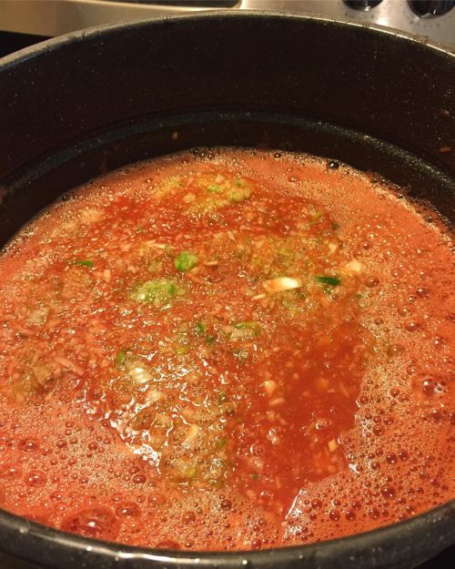 The spaghetti sauce is in the pot and starting it’s long day of a slow cooking down. #tomatoes #food