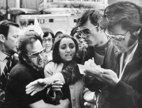 XXX historicaltimes:  Elvis signing an autograph photo