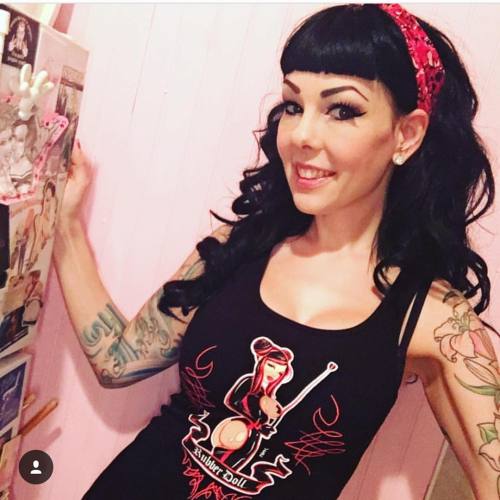 The beautiful @evilyn13 wearing a RubberDoll &ldquo;Mistress&rdquo; tank. go follow her now for mor