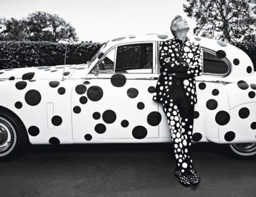 George Clooney wearing Giorgio Armani suit, shirt, and shoes customized by Yayoi Kusama for W Magazi