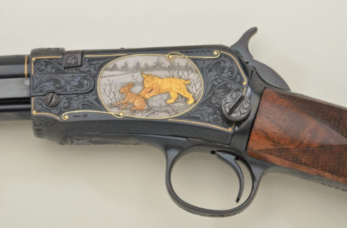 Engraved and gold inlaid Winchester Model 1906 pump action rifle.Sold at Auction: $4,500