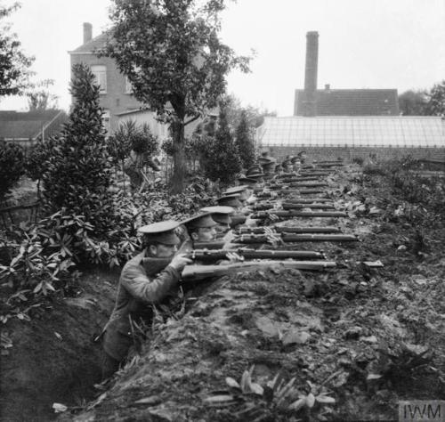 scrapironflotilla: 2nd Battalion, Scots Guards testing a hastily dug trench at Ghent, October 1914.