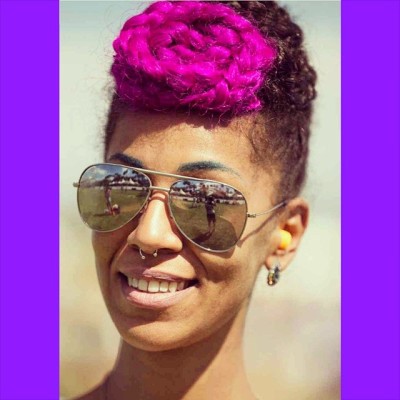 Coachella festival styles #NaturalHair #aunatural #naturalbeauty #bun #braids #aviators #iridescent #hautepink #coachella #streetstyle #LA #hippy #rainbows #noserings #bodyjewelry #refinery29 #hotpink