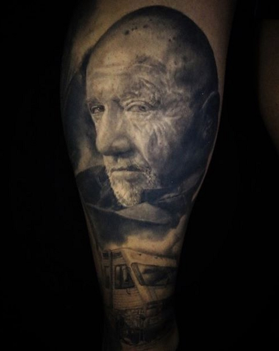 Neotraditional Mike Tyson portrait tattoo on the left