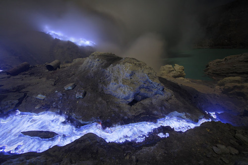 mysticplaces:  Martin Rietze’s photos of the volcano Kawah Ijen in East Java, Indonesia- its sulfer-rich flows and gases rise to temperatures upwards of 600° C, causing the flames to burn a bright, electric blue when viewed at night. photography by