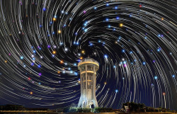 nubbsgalore:  these star trail composite images, created by stacking several photos on top of each other, were taken by justin ng from the heavily light polluted city of singapore.  notes justin, “many people don’t believe such incredible star images