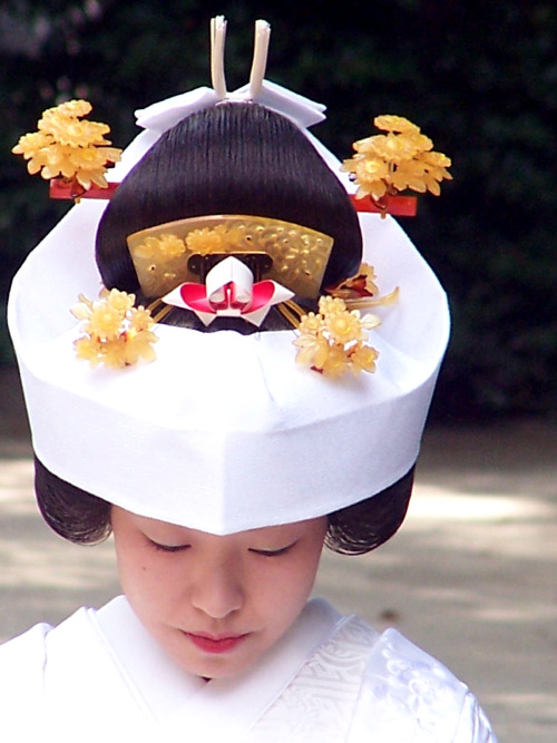 Japanese bride participating in a Shinto wedding celebration at Meiji shrine