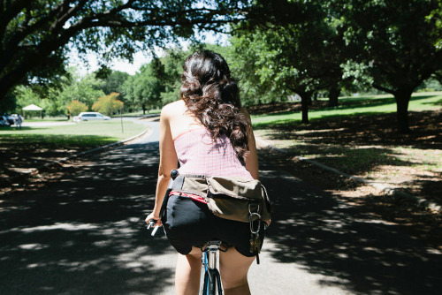 sexycyclists: brunette babe rides bike