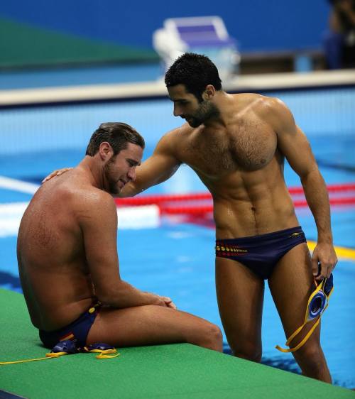 blackandwhite1789:  The beautiful Marc Minguell consoles his team mate after Spain’s loss 