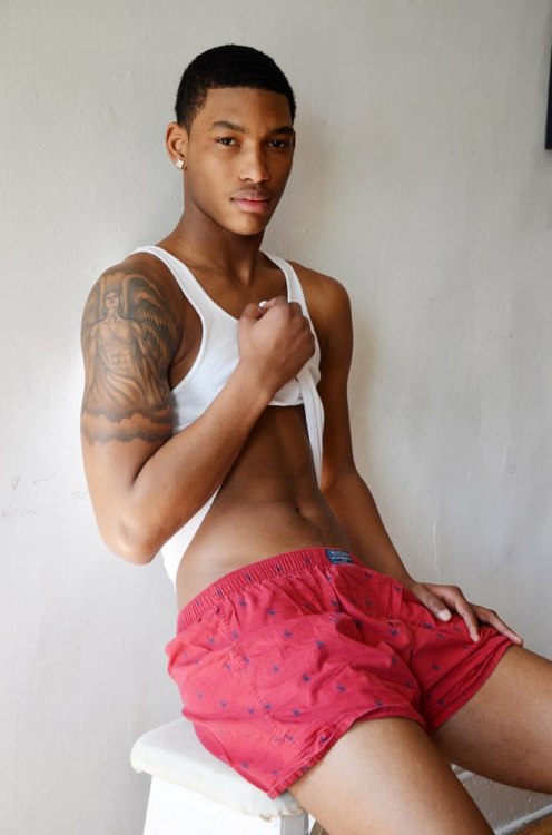 Sexy black boy in red shorts