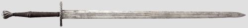 art-of-swords:  German Two-hand Sword  Dated: made in the style of circa 1530 Measurements: overall length 138.5 cm; blade length 106 cm The sword feature a broad double-edged blade cut with a series of narrow fullers both on each side and over the